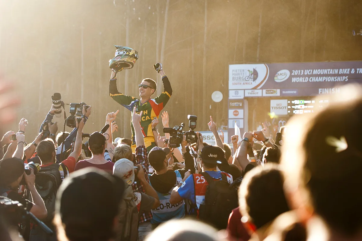 Winner Greg Minaar gets lifted at the UCI MTB World Champs, Pietermaritzburg, South Africa on August 26th - Septemebr 1st, 2013